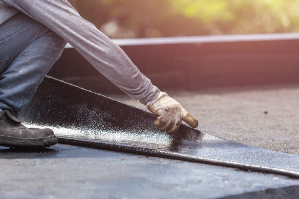 Professional Basement Waterproofing technician working in Bellville, OH